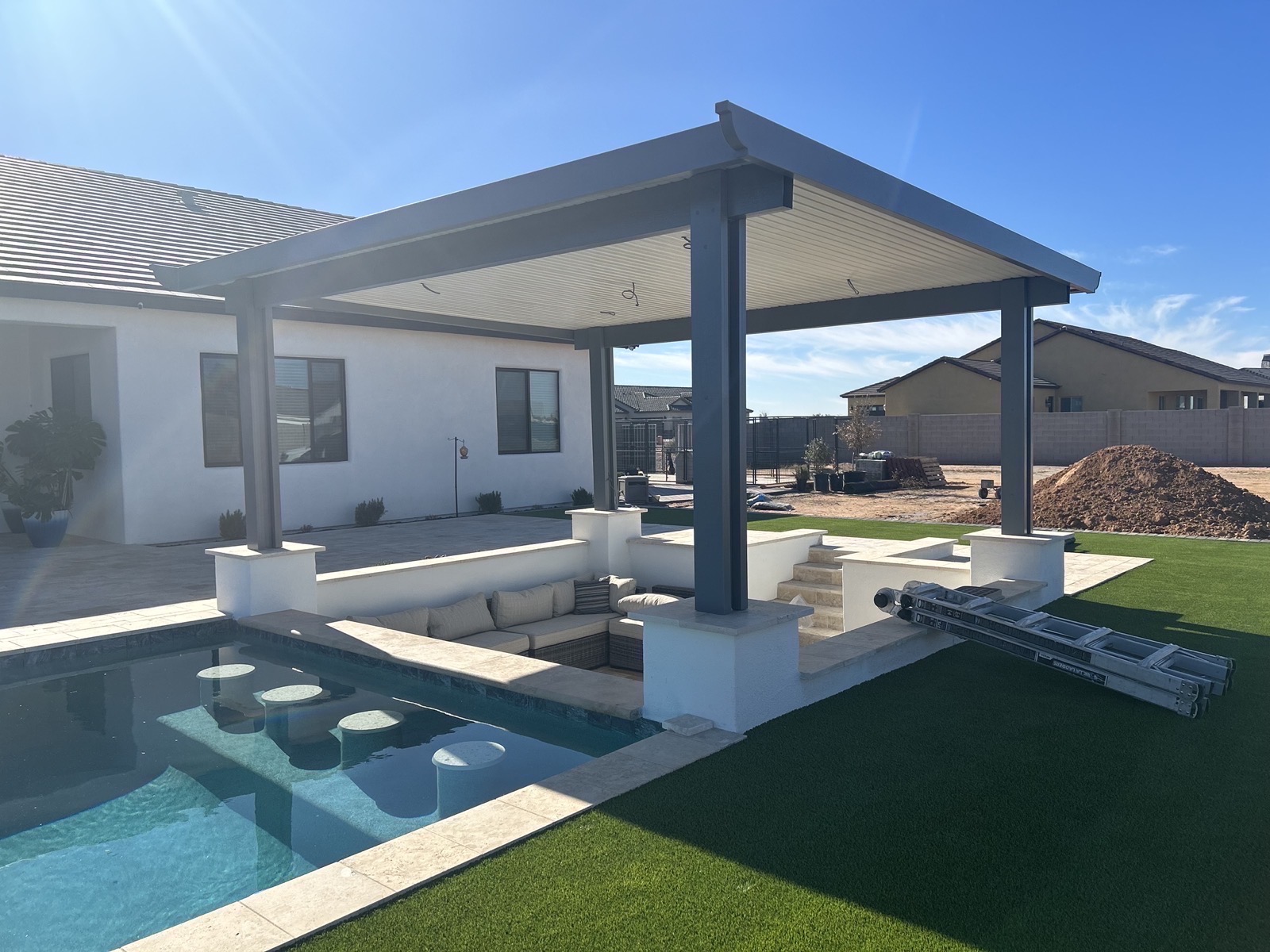 Modern louvered pergola over a pool deck — Valley Pergola install